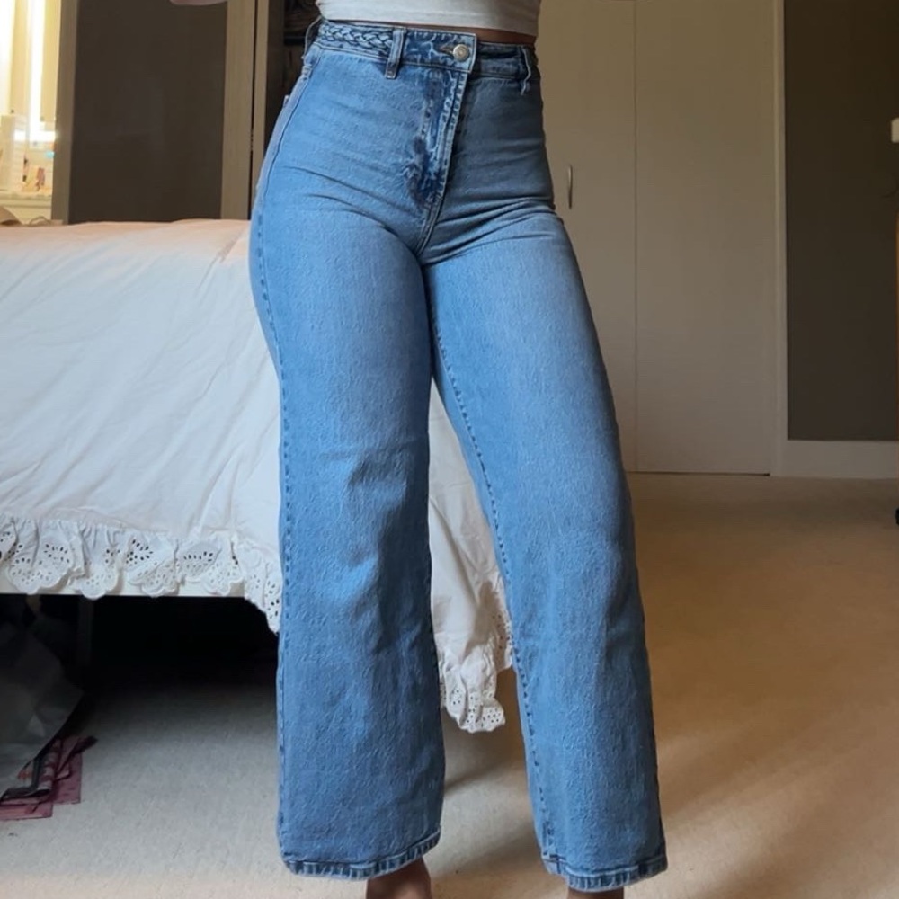 high waisted wide leg jeans with braided waist detail
